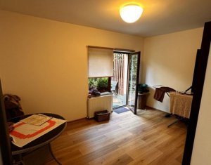 Apartament cu gradina in bloc tip vila, 75 mp util + 120 mp, parcare 